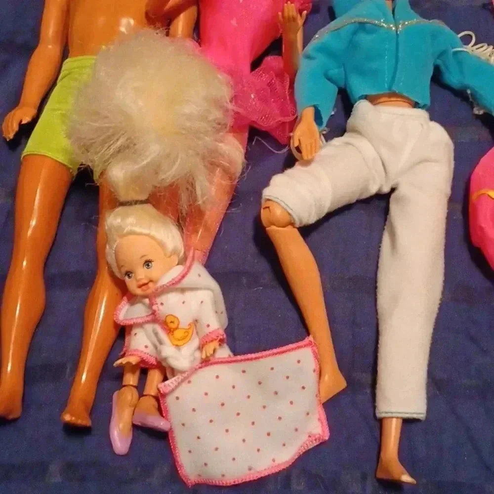 2 vintage Mattel Barbie dolls , one  Ken and one mini with extras
